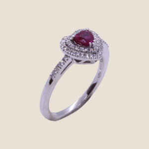 Ring in gold 1with heart cut ruby and diamonds